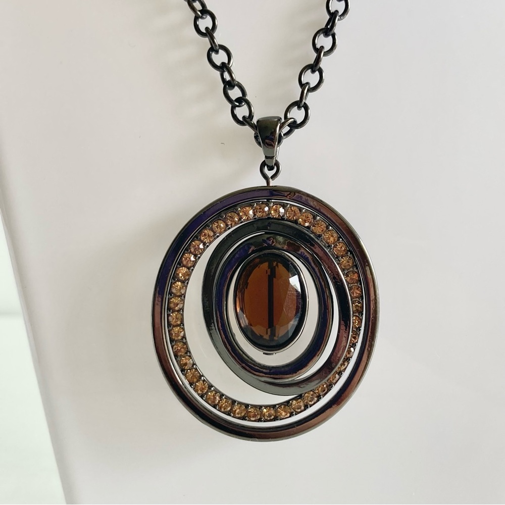 Multi-Ring Pendant Necklace with Amber tone Accent - gun metal tone Chain